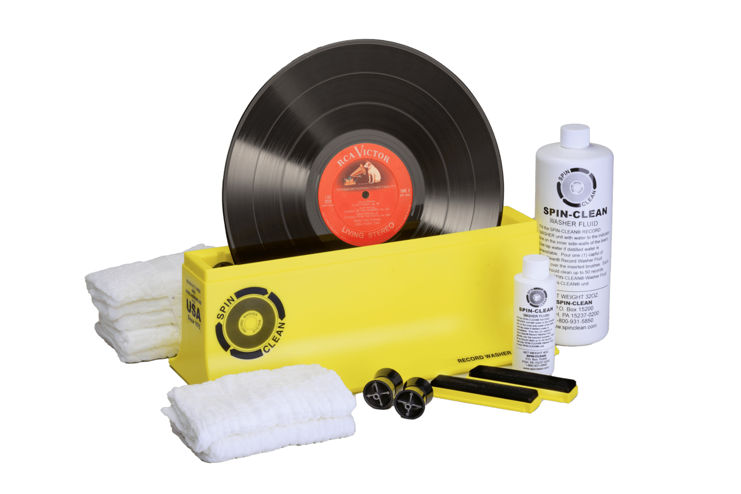 Spin Clean vinyl record cleaner washing an LP to remove dust and grime